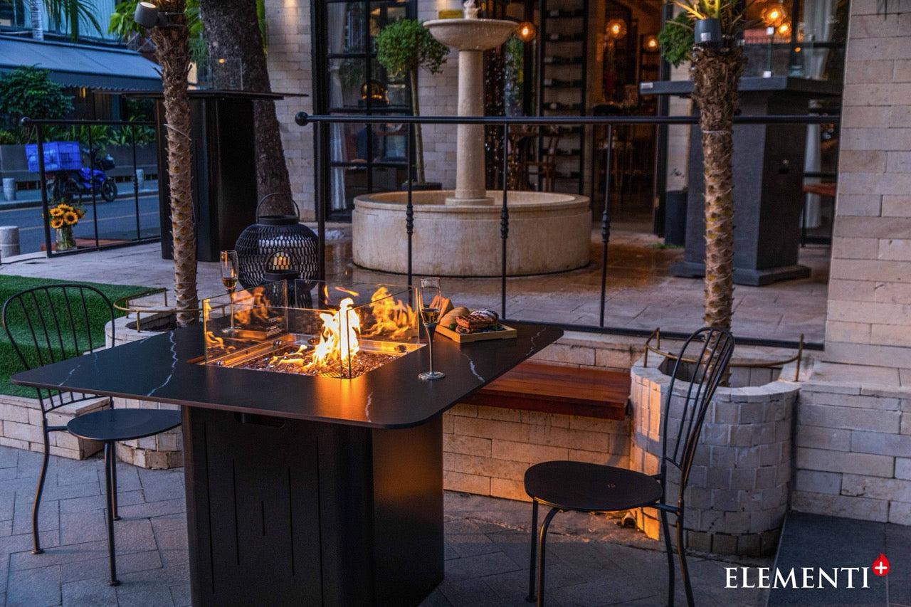 Elementi Plus Brugge Dining Fire Table evening ambiance