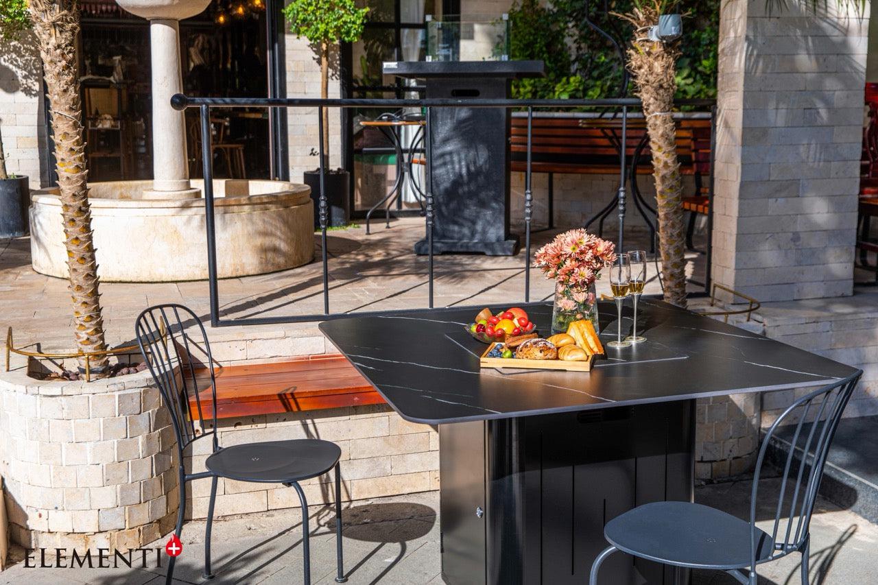 Elementi Plus Brugge outdoor dining with fire feature