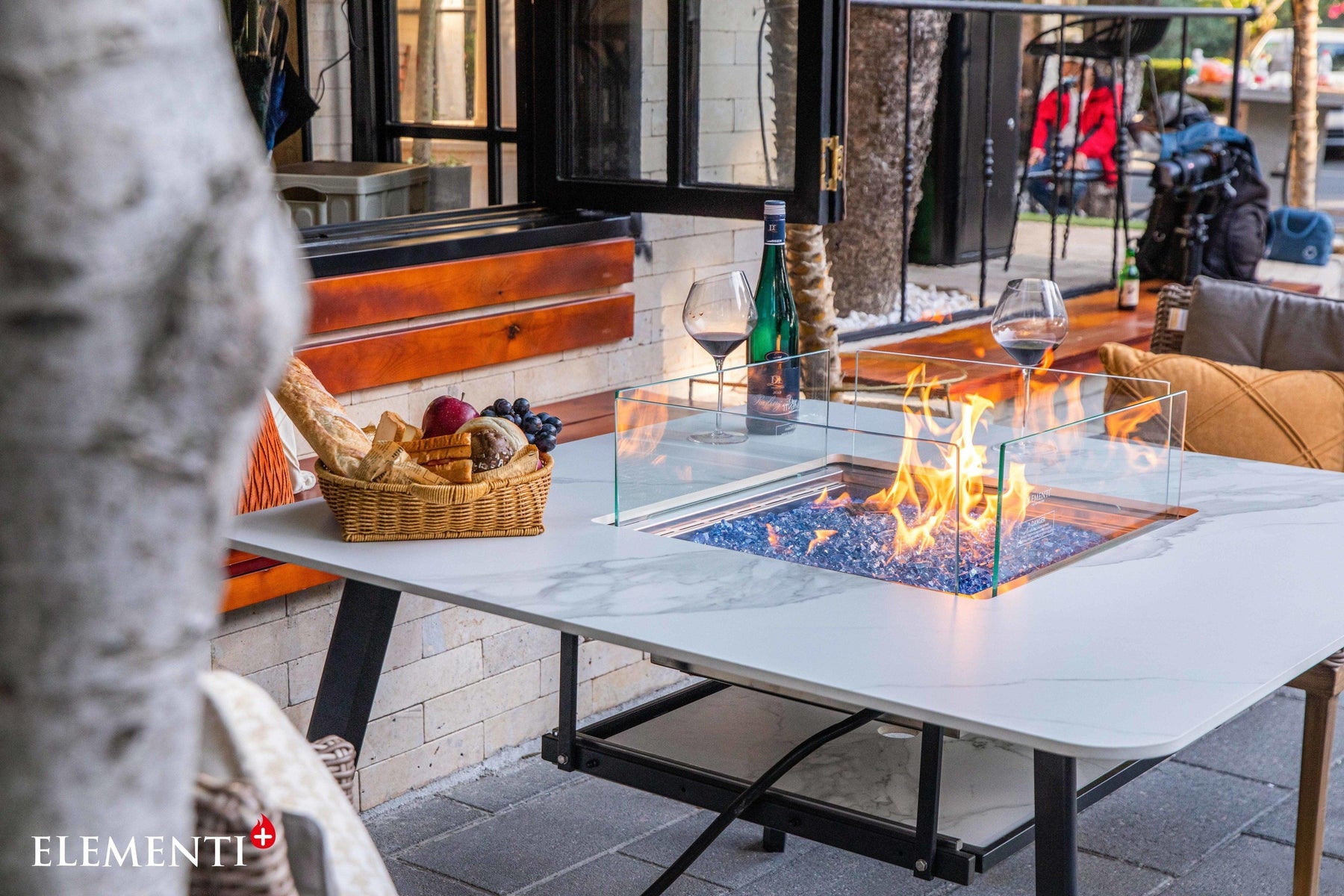 Elementi Plus Helsinki Dining Fire Table outdoor setting