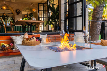 Elementi Plus Helsinki Dining Fire Table evening ambiance