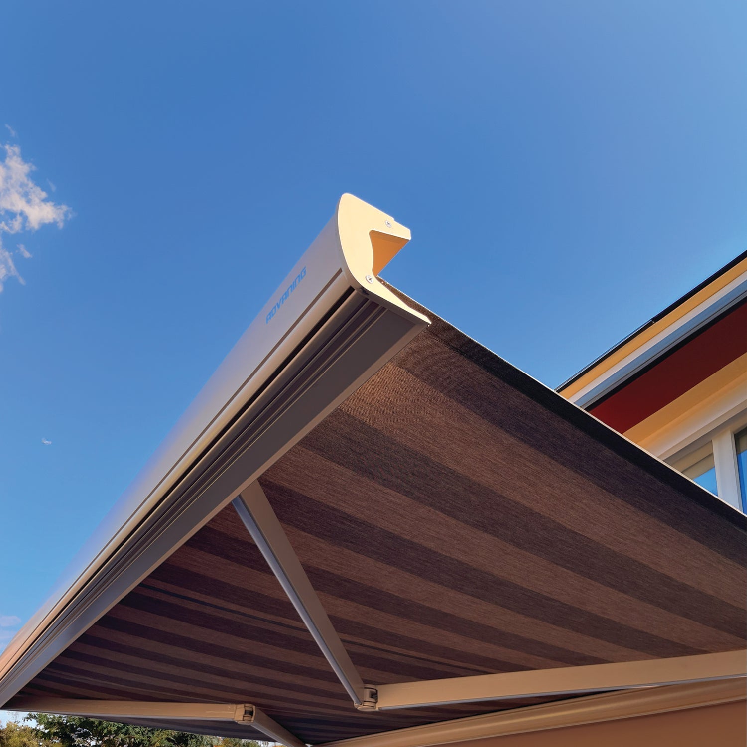 Advaning Prestige Pro awning in Cedar and Clove Stripes